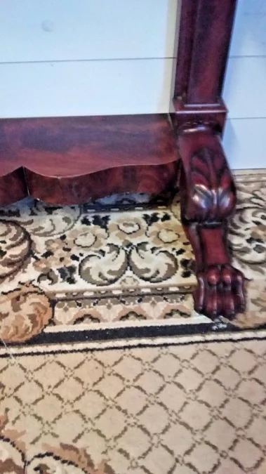 Petite console ouvrant par un tiroir en ceinture Empire en acajou 19ème