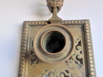 Bougeoir à main bronze doré tête faune grotesque XIXème siècle