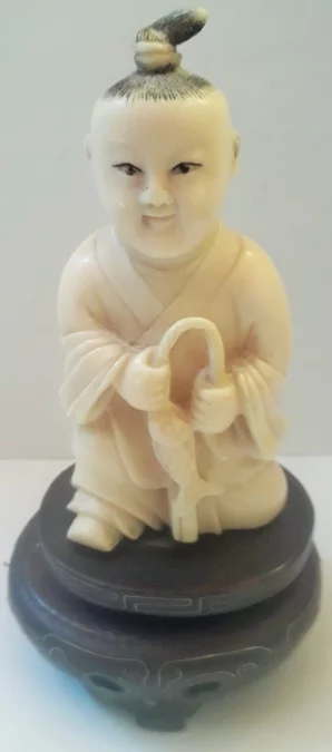 Okimono Netsuké sculpté d'un enfant  japon 19ème