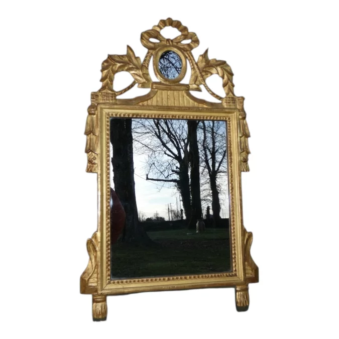 Miroir ancien de style Louis XVI Provençal , bois sculpté et doré fin 19 ème