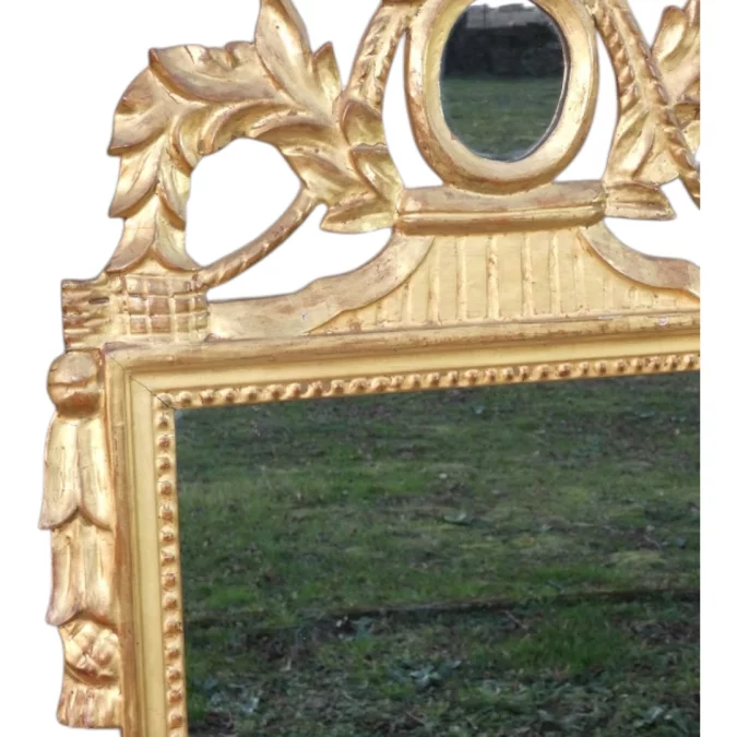 Miroir ancien de style Louis XVI Provençal , bois sculpté et doré fin 19 ème
