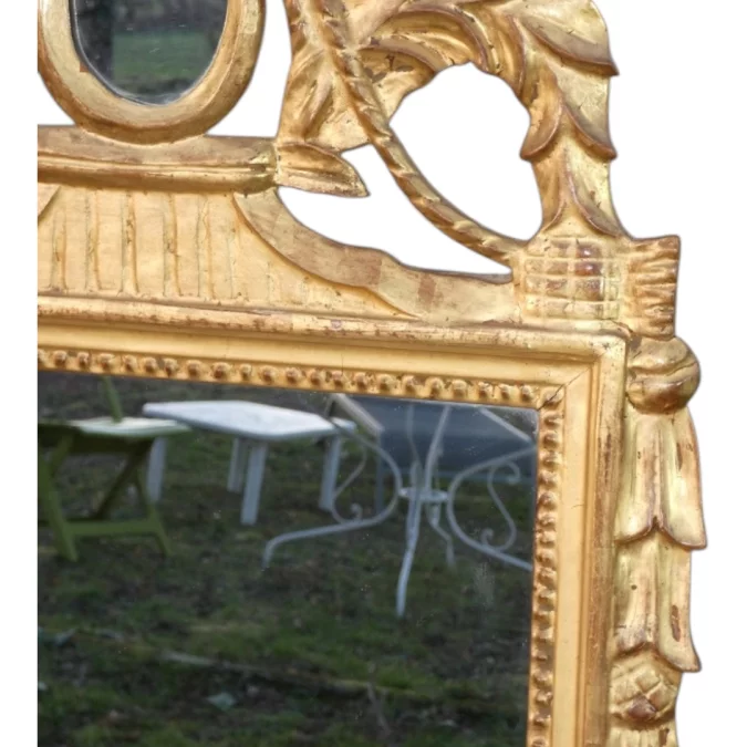 Miroir ancien de style Louis XVI Provençal , bois sculpté et doré fin 19 ème