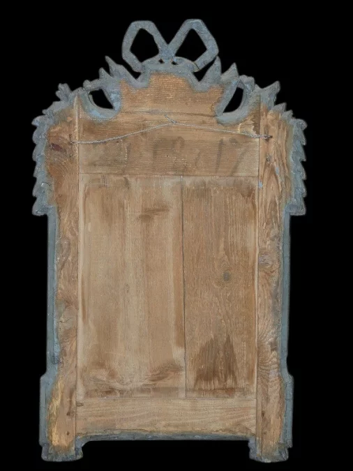 Miroir Louis XVI 18 ème en bois sculpté et doré
