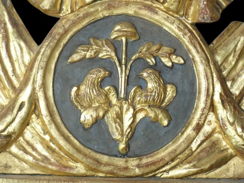 Miroir Louis XVI 18 ème en bois sculpté et doré