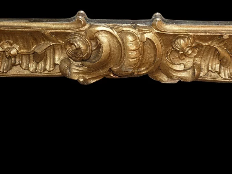 Miroir de boiserie "aux perroquets" en bois sculpté et laqué de style Louis XV