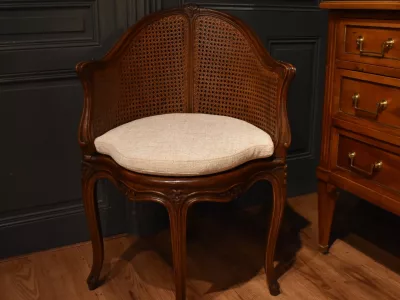 Fauteuil de bureau canné de style Louis XV