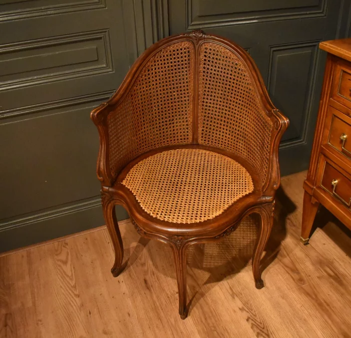 Fauteuil de bureau canné de style Louis XV