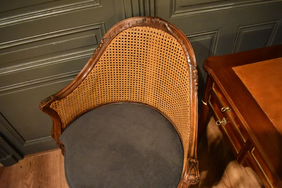 Fauteuil de bureau canné de style Louis XV