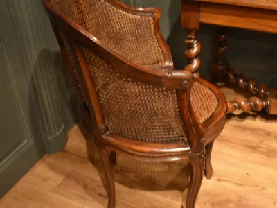 Fauteuil de bureau canné de style Louis XV