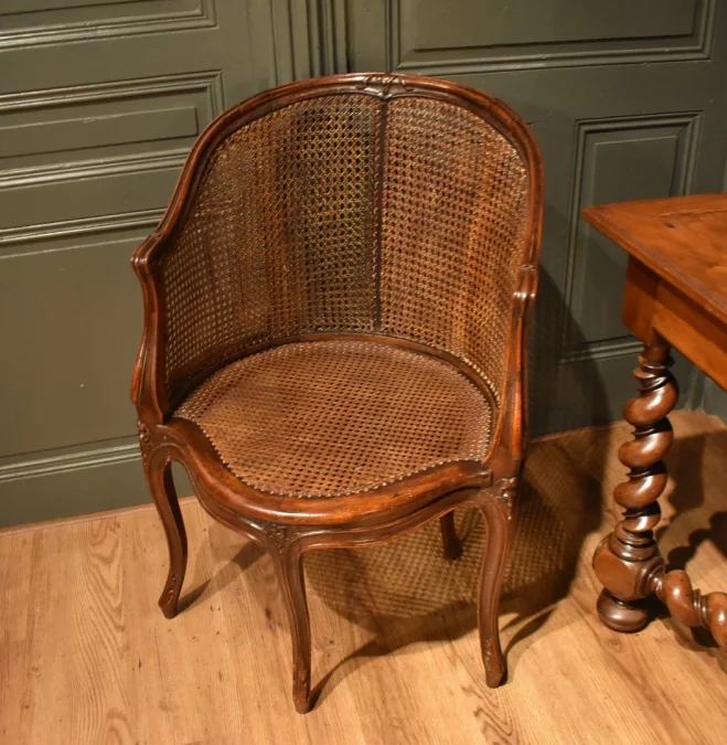 Fauteuil de bureau canné de style Louis XV