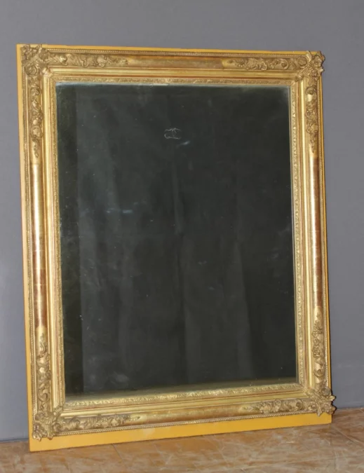Miroir restauration en stuc doré XIX