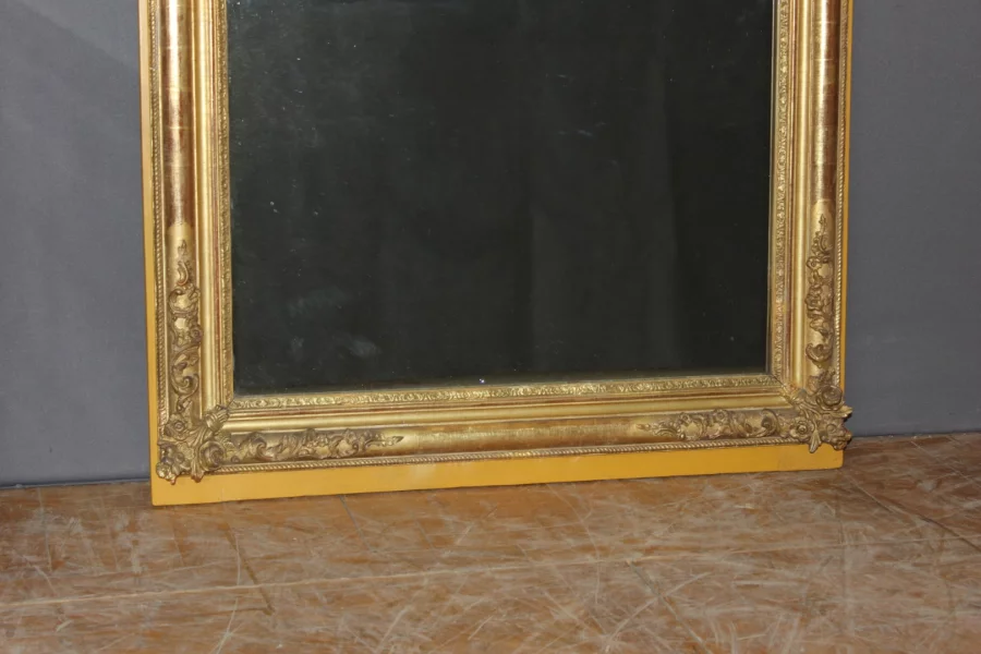 Miroir restauration en stuc doré XIX