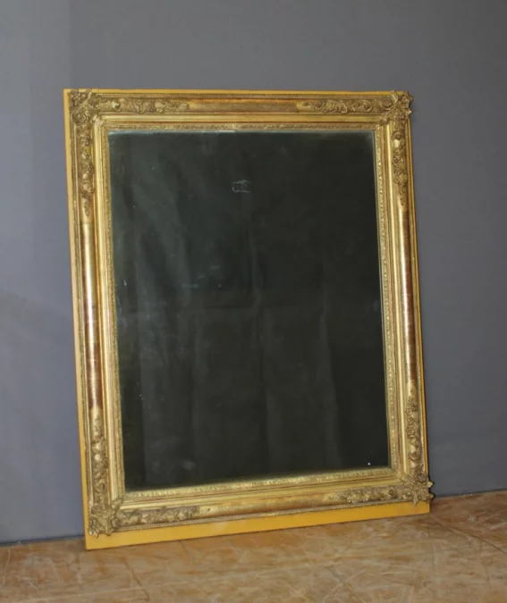 Miroir restauration en stuc doré XIX