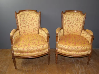 Pair Of Louis XVI Bergère Armchairs In Late 18th-century Walnut