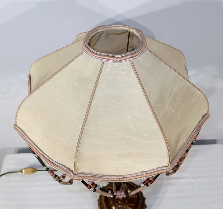 SPELTER-LAMPE MIT CHERUB-FLÖTIST