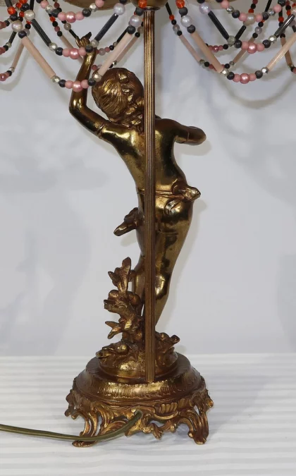 SPELTER-LAMPE MIT CHERUB-FLÖTIST