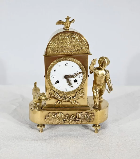 Petite Pendulette de Voyage en Bronze Doré,  époque Empire -  Début XIXe