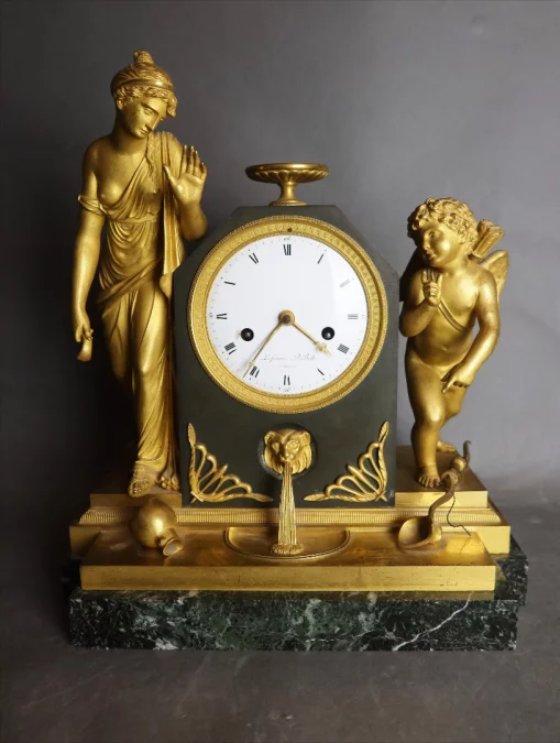 RELOJ DE BRONCE DORADO