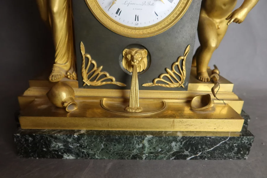 RELOJ DE BRONCE DORADO