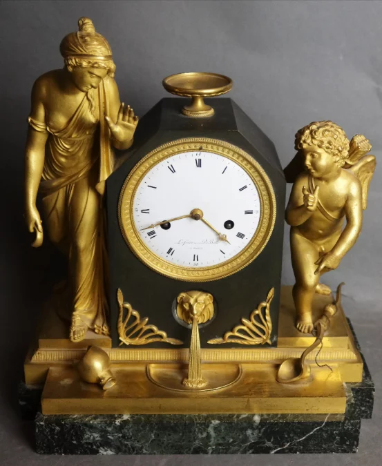 RELOJ DE BRONCE DORADO